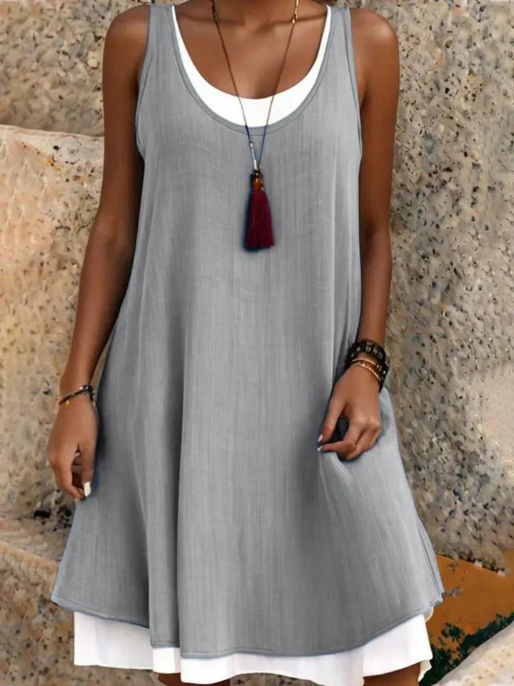 Sunlit Sleeveless Midi Dress.